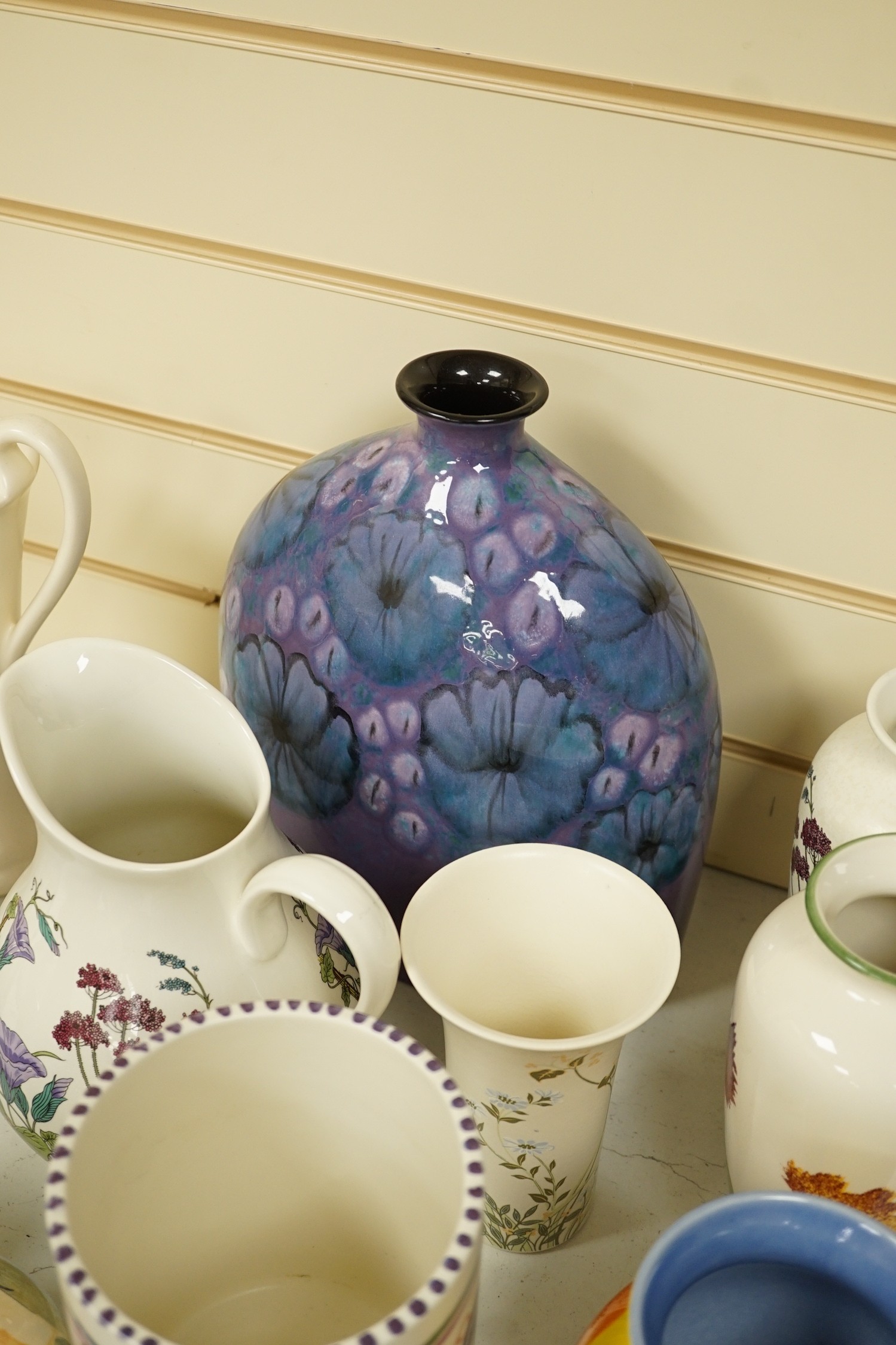 A collection of Poole pottery jugs and vases. Tallest 29cm